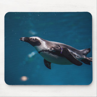 Swimming Pengiun in the Sea. Mouse Mat