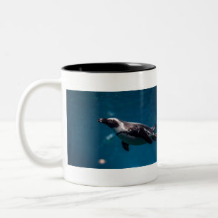 Swimming Pengiun in the Sea. Two-Tone Coffee Mug