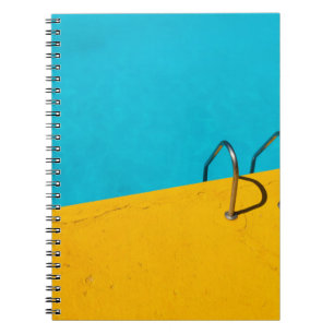 Swimming pool with stainless steel ladder notebook