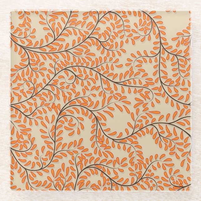 Swirling Orange Leaves on Beige Background Glass Coaster (Front)