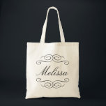 Swirly script bridesmaid personalised gift tote bag<br><div class="desc">This personalised tote bag features the recipient's name in an elegant script font with delicate swirl flourish. Thank your bridal party with these chic custom tote bags. Personalise each bag with the recipient's name and fill it her favourite things as a gift bag. Your wedding attendants can use these eco-friendly...</div>