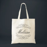 Swirly script bridesmaid personalised gift tote bag<br><div class="desc">This personalised tote bag features the recipient's name in an elegant script font with delicate swirl flourish. Thank your bridal party with these chic custom tote bags. Personalise each bag with the recipient's name and fill it her favourite things as a gift bag. Your wedding attendants can use these eco-friendly...</div>