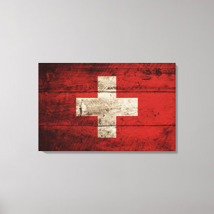 Switzerland Flag on Old Wood Grain Canvas Print