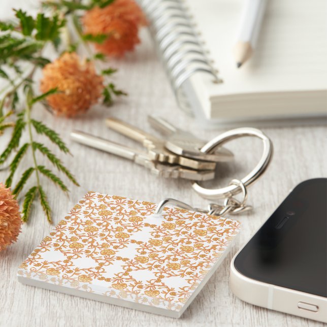 Symmetrical floral pattern with orange motifs rese key ring (Front Right)