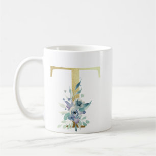 T golden initial with blue floral foliage coffee mug