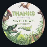 T-Rex Dinosaur Birthday Party Thank You Classic Round Sticker<br><div class="desc">Give your child's birthday celebration the dino touch with these dinosaur-themed kids' birthday party labels. These stickers feature a high-quality watercolor illustration of a T-Rex and various other dinosaurs, creating a vibrant prehistoric scene amidst lush jungle foliage. The text 'Thanks for celebrating (child's name)'s birthday' adds a personalised touch, making...</div>