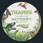 T-Rex Dinosaur Birthday Party Thank You Classic Round Sticker<br><div class="desc">Give your child's birthday celebration the dino touch with these dinosaur-themed kids' birthday party labels. These stickers feature a high-quality watercolor illustration of a T-Rex and various other dinosaurs, creating a vibrant prehistoric scene amidst lush jungle foliage. The text 'Thanks for celebrating (child's name)'s birthday' adds a personalised touch, making...</div>