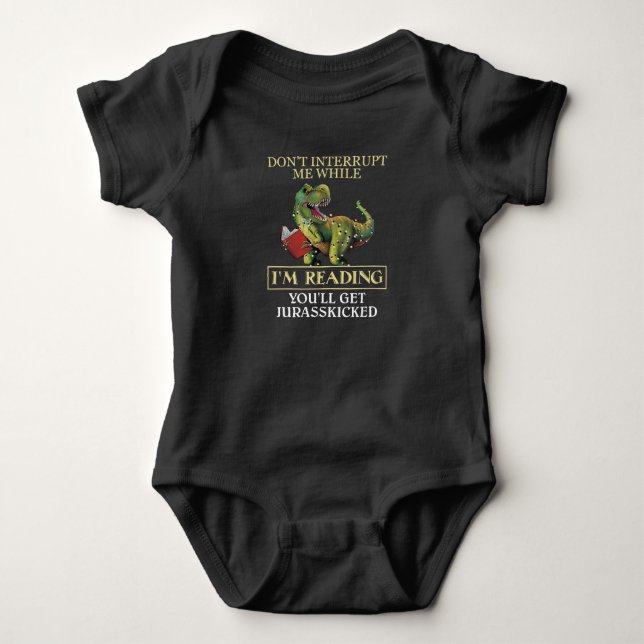 T Rex Don't Interrupt Me While I'm Reading Books Baby Bodysuit (Front)