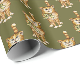 tabby cat on green wrapping paper