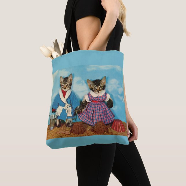 tabby kittens playing on the beach tote bag (Close Up)