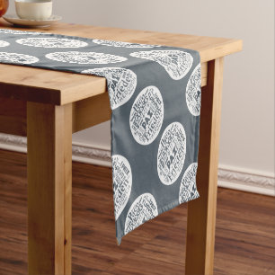 Table runner with multilingual peace design