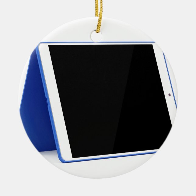 Tablet computer on white ceramic tree decoration (Front)