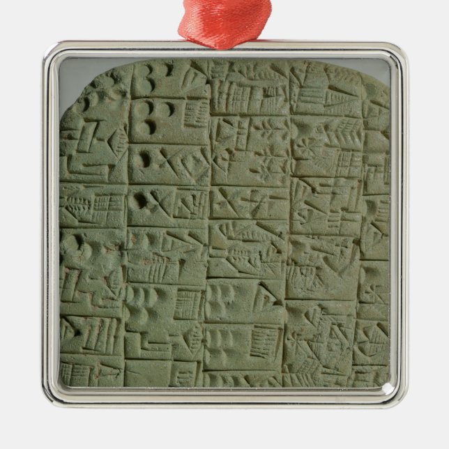 Tablet with cuneiform script metal tree decoration (Front)