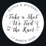 Take A Shot Tied the Knot Wedding Drink Favour Classic Round Sticker<br><div class="desc">A Classic Black Thank You Wedding Favour Label Sticker featuring "Take a Shot We Tied the Knot" in a rustic modern elegant font calligraphy. 
You can easily personalised it with your names and wedding date.</div>