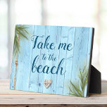 “Take Me to Beach” Rustic Light Blue Coastal Wood Plaque<br><div class="desc">Keep your summer memories close to your heart all year long with this beachy light blue wood with nautical rope, coral heart, and coastal sea grass easel back plaque. Place in your workspace and get ready to be transported back to your fondest happy place. Great for daily inspiration! You can...</div>
