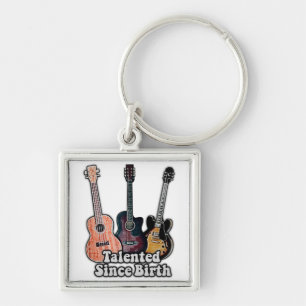 Talented since birth. vintage colourful guitar key ring