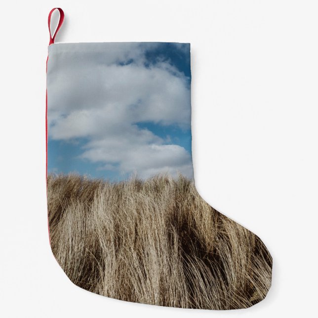 Tall grass under cumulus clouds small christmas stocking (Front)