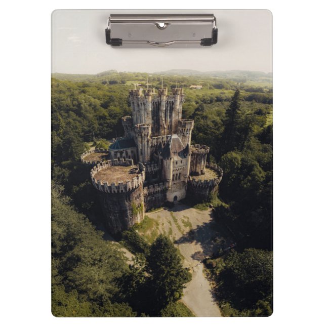 Tall Grey Stone Castle in Green Overgrown Woods Clipboard (Front)