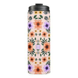 Tall travel mug with a floral pattern