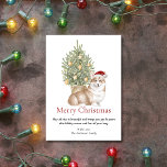 Tan Corgi and Christmas Tree Pet Dog Holiday Card<br><div class="desc">This adorable corgi themed Christmas card features a tan and white corgi wearing a Santa hat sitting in front of a lit Christmas tree. The greeting on the card reads "Merry Christmas" "May all that is beautiful and brings you joy be yours this holiday season and last all year long"...</div>