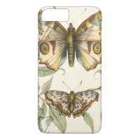 Tandem Butterflies Over Green Leaves