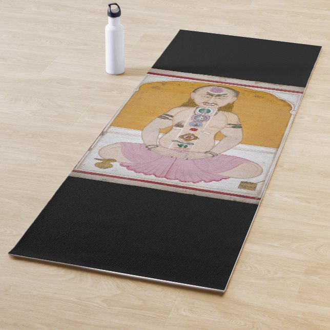 Tantric yogi showing chakras and kundalini yoga mat (In Situ)