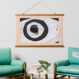 target tears up hanging tapestry