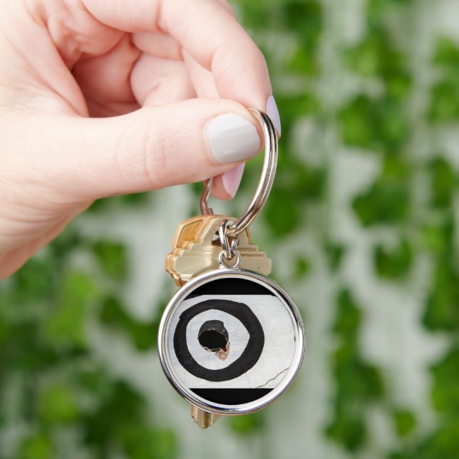 target tears up key ring (Hand)