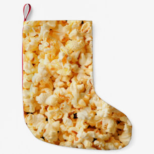 Tasty popcorn on whole background. Food Small Christmas Stocking