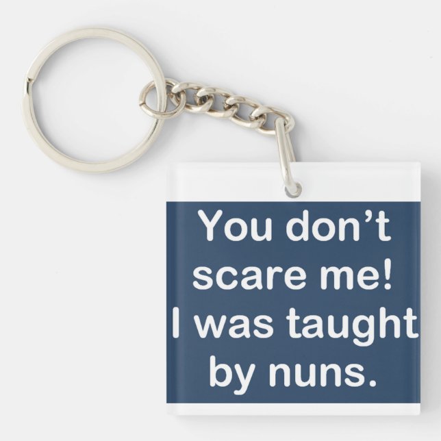 Taught by Nuns in Dark Blue Key Ring (Front)
