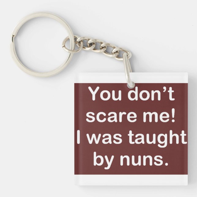 Taught by Nuns in Dark Key Ring (Front)