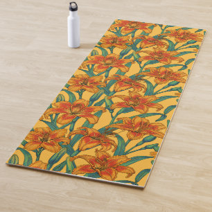 Tawny daylily flowers, blue and yellow yoga mat