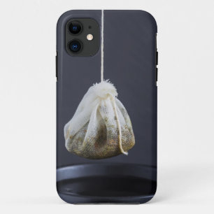 Tea bag is hung in a cup iPhone 11 case