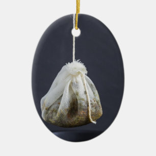Tea bag is hung in a cup ceramic tree decoration