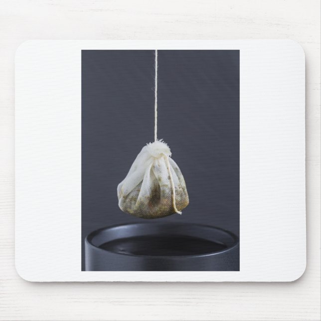 Tea bag is hung in a cup mouse mat (Front)