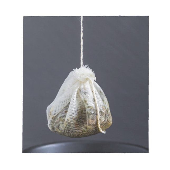 Tea bag is hung in a cup notepad (Front)