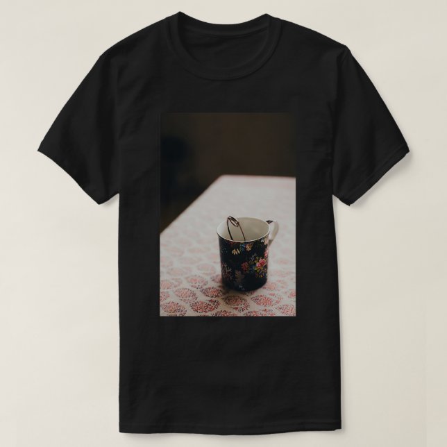 Tea cup on a table T-Shirt (Design Front)