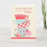 Tea Cups and Roses, Happy Birthday Sister Card<br><div class="desc">Celebrate a Sister's special birthday with this pretty card with a set of tea cups in flower,  polka dot and gingham patterns,  pink roses and a cupcake with pink polka dots heart topping. Background is cream with a coral lace ribbon graphic border. Graphics©MyClipartStore</div>