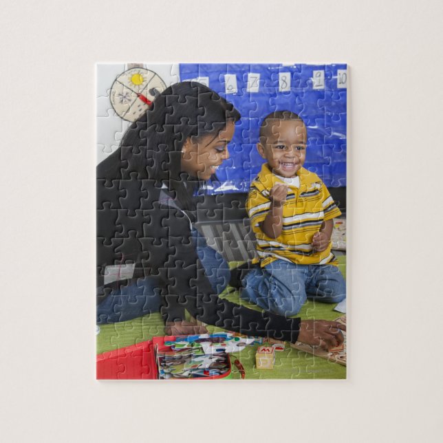 Teacher with toddler in daycare jigsaw puzzle (Vertical)