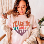 Teaching is a Work of Heart Teacher T-Shirt<br><div class="desc">Teaching is a Work of Heart. Our Teacher Quote T-shirts and Hoodies will bring lots of positivity to your days. Choose the colour that best suits you and purchase one to wear yourself or give to a loved one for their Birthday, as a Christmas gift of just because to say...</div>