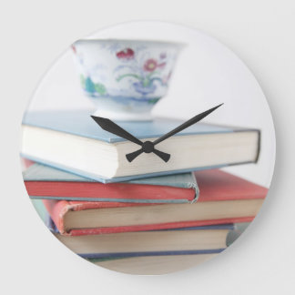 Teacup on book stack clock