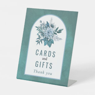 Teal and aqua blue flowers and foliage wedding pedestal sign