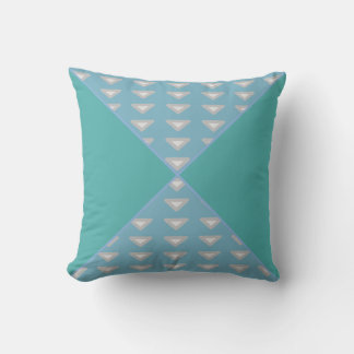 Teal and blue triangles, small triangle patterns cushion