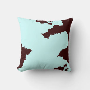 teal and brown abstract pattern pillow