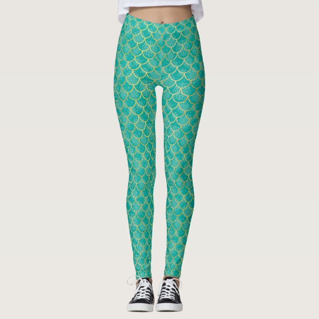 Teal and gold snowflake with fish scales pattern leggings (Front)