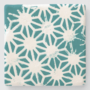 Teal and white geometric pattern stone coaster