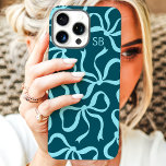 Teal Bow Monogram iPhone 16 Pro Max Case<br><div class="desc">Dress up your phone in style with this chic and trendy teal phone case! Featuring a playful pattern of hand-drawn bows and personalised with your monogram, this case is the perfect blend of fashion and function. Made from durable materials to protect your phone from everyday bumps and scratches. A great...</div>