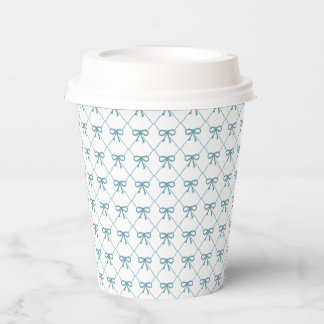 Teal bows on white background, paper cups