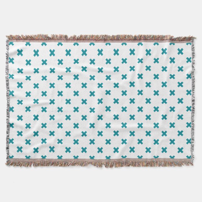 Teal cross stitches on white throw blanket (Front)