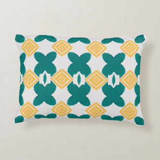 teal-green, butterfly-like shape & yellow diamond decorative cushion